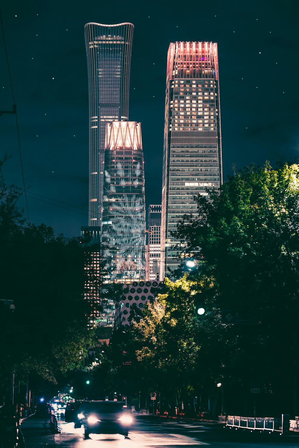 high-rise buildings with turned-on lights at nighttime