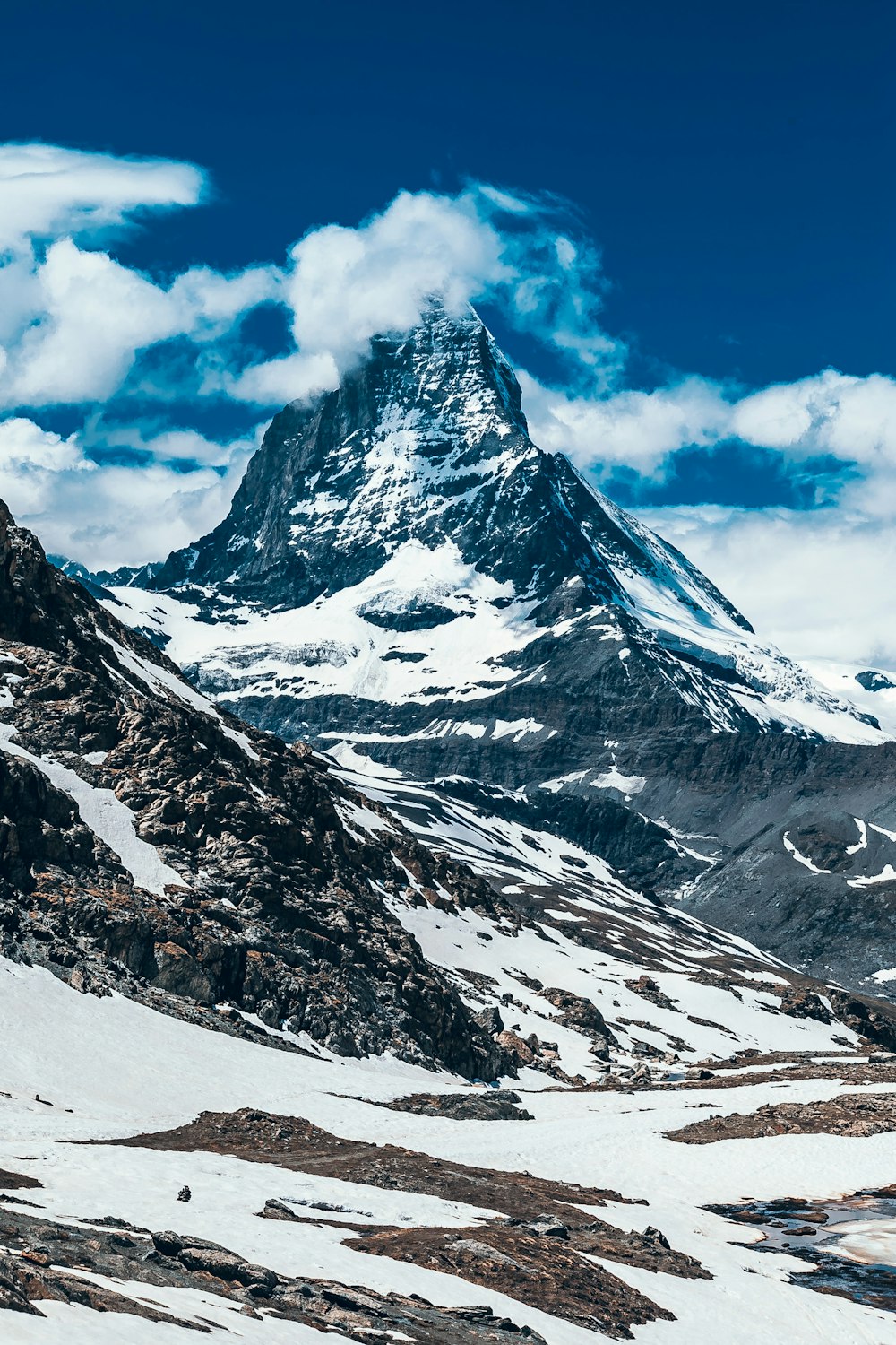 snow covered mountain during daytime