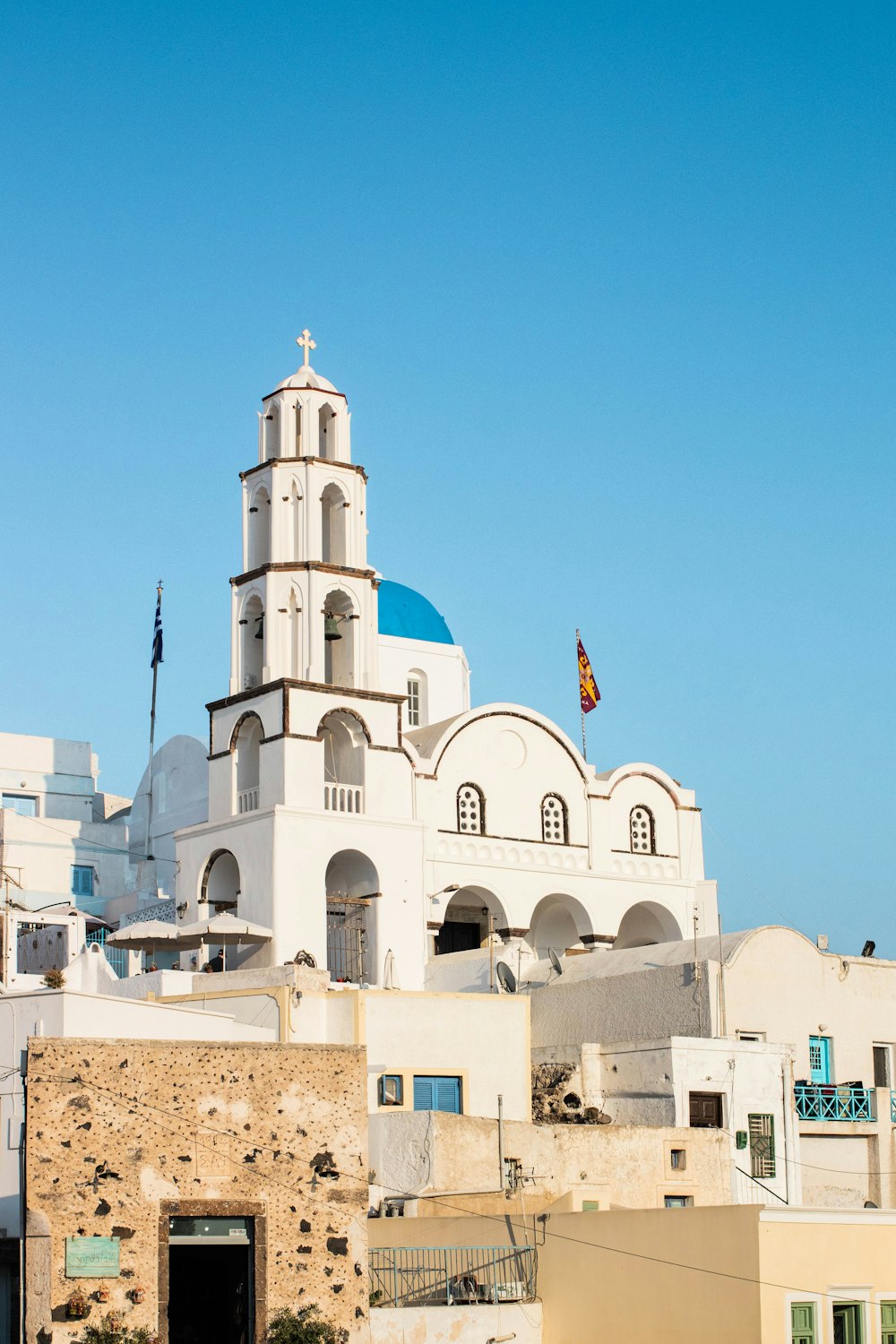 white and blue concrete buildings during daytime