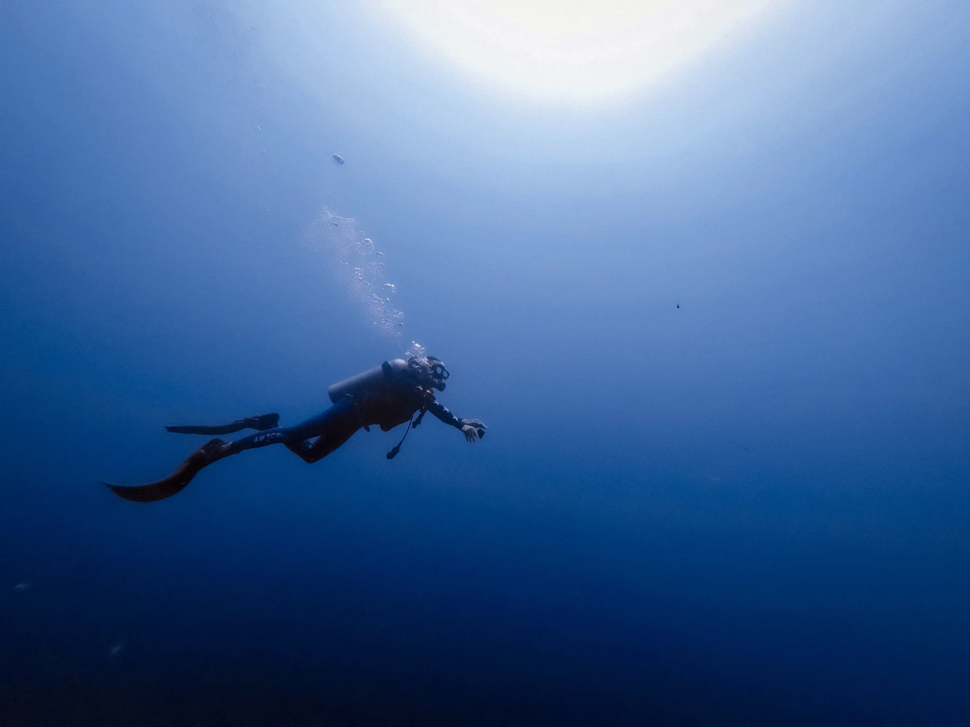 Commercial diver working below the surface, representing the choice of the right specialist offshore accident attorney