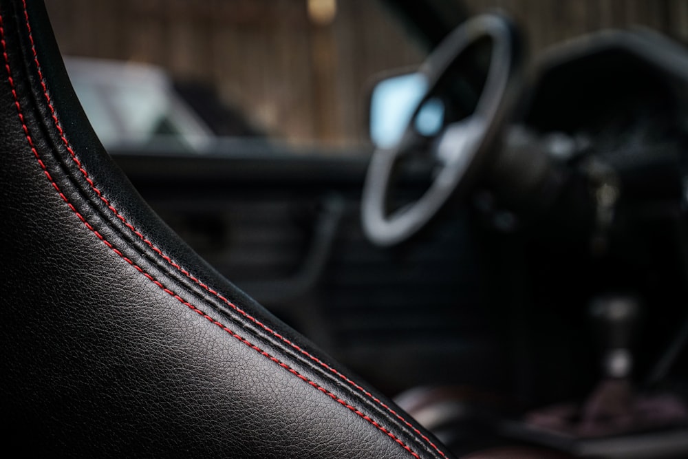 selective focus photography of black vehicle interior