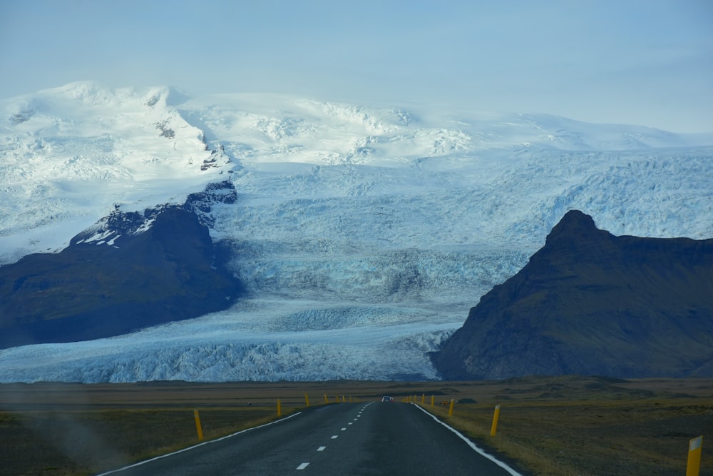 road near snow-capped mountain