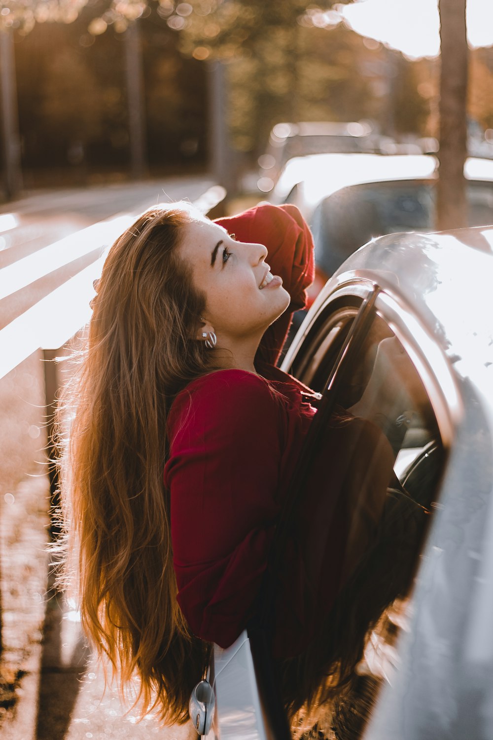 woman wears red dress