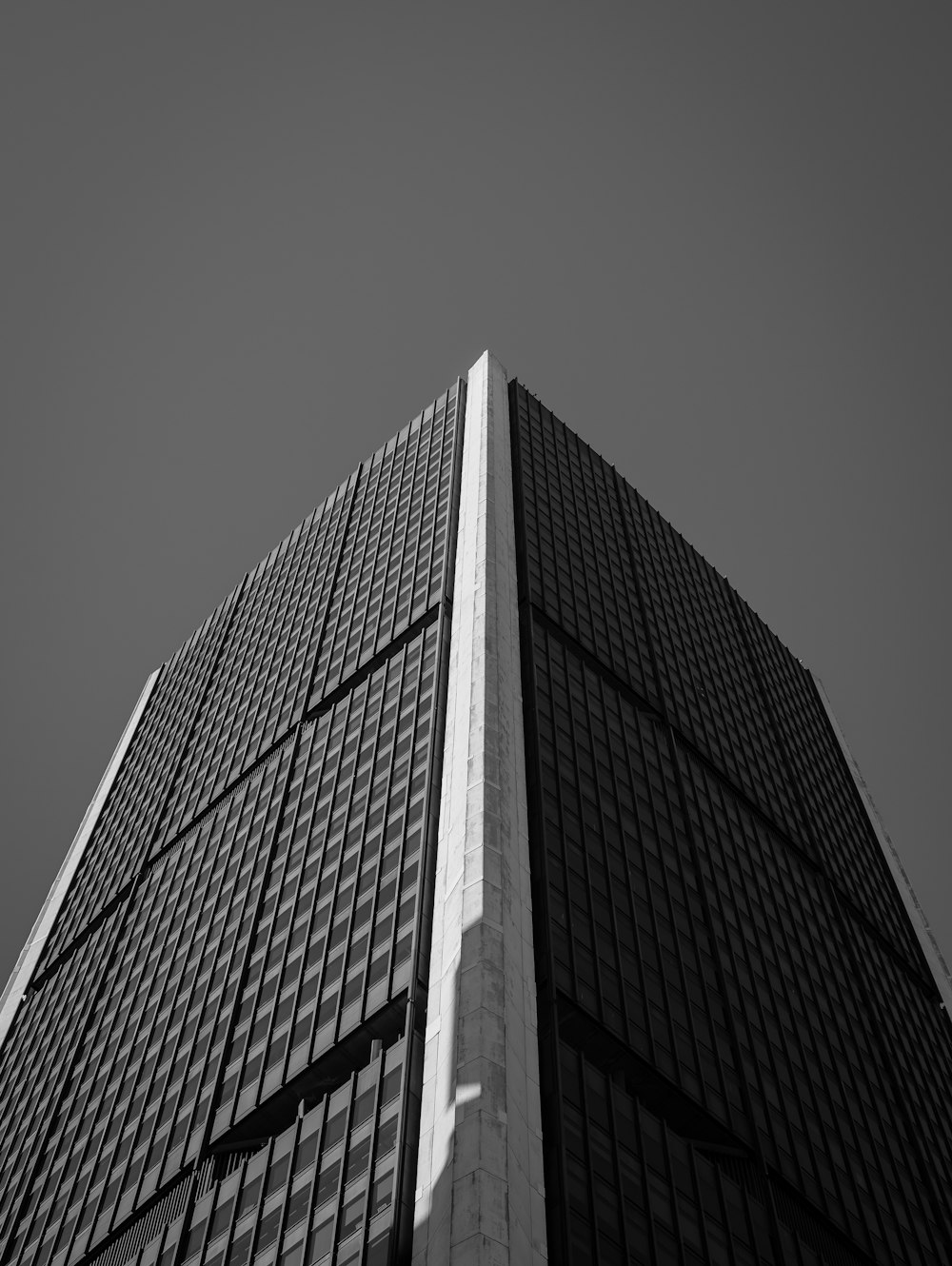 grayscale photography high-rise building