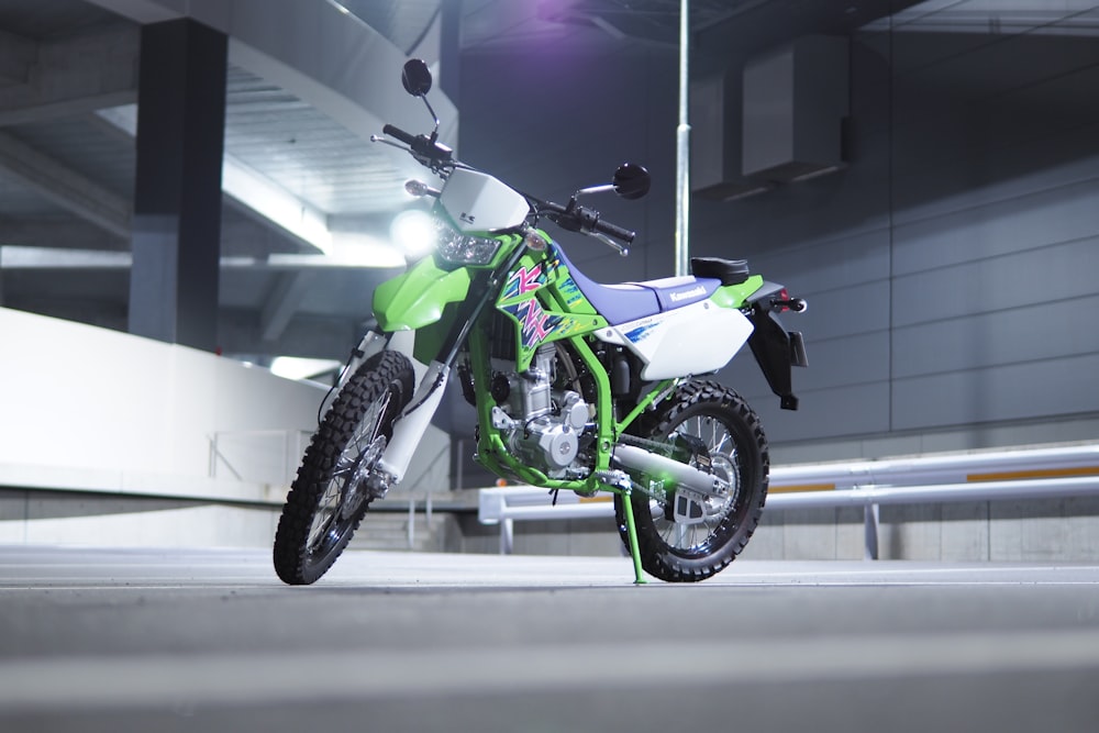 parked green and black dirt bike