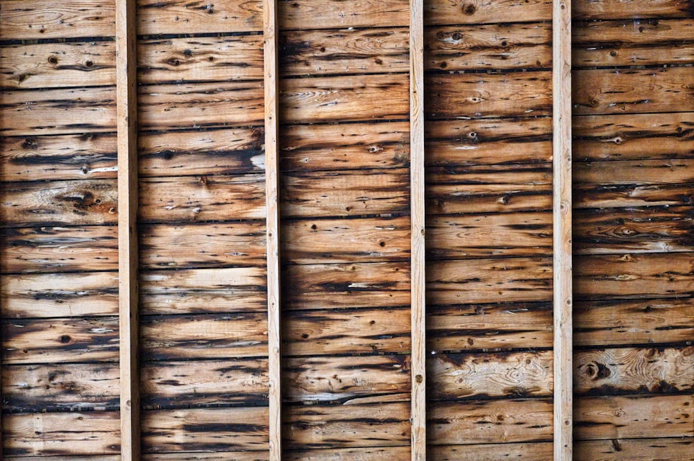 a close up of a wooden wall made of boards