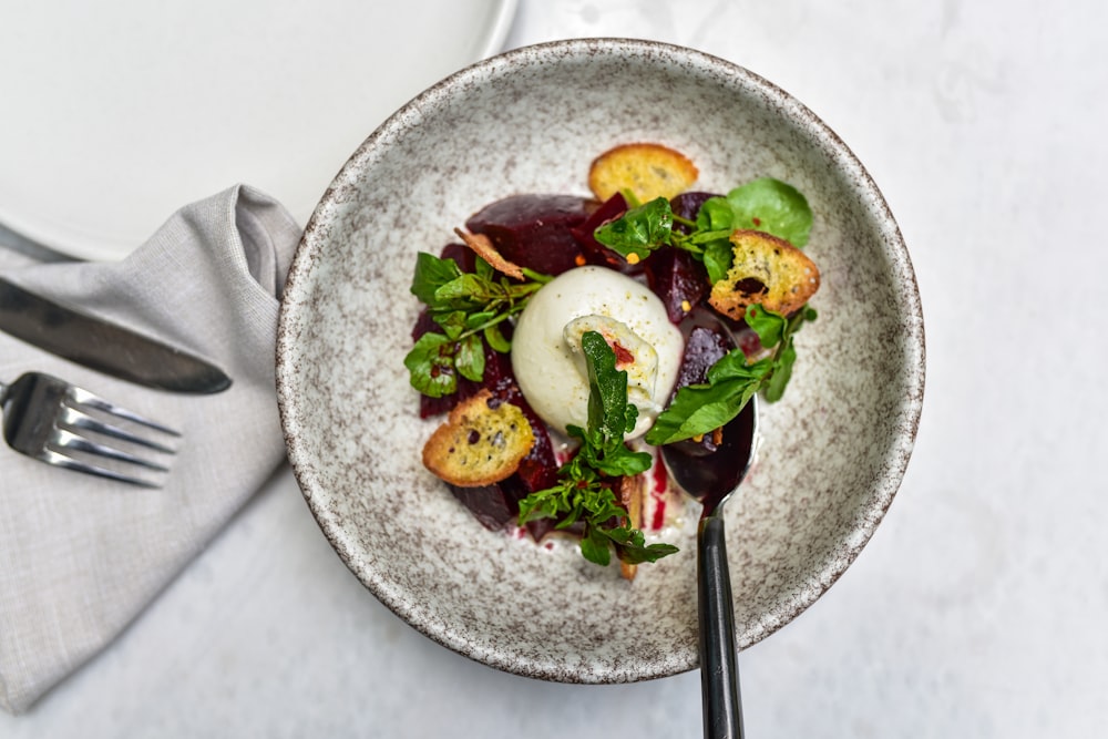 vegetable salad in gray bowl