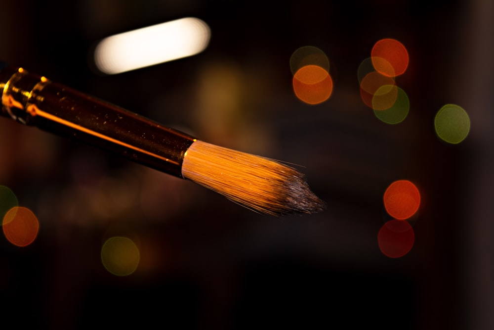 a close up of a brush with a blurry background