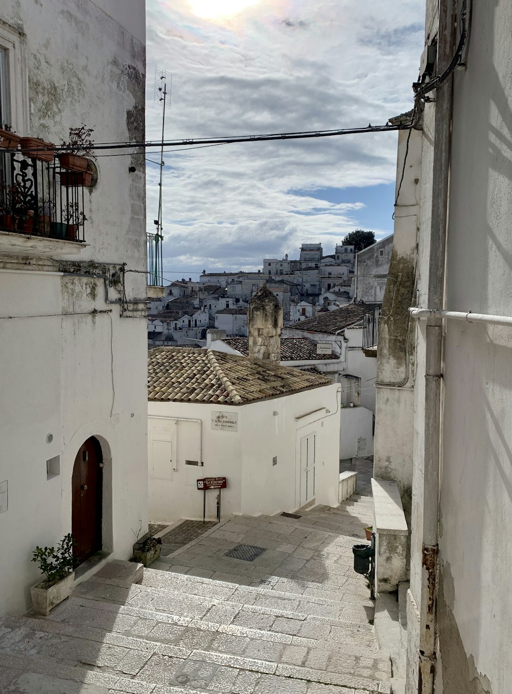 houses and buildings under white and blue sky during daytime