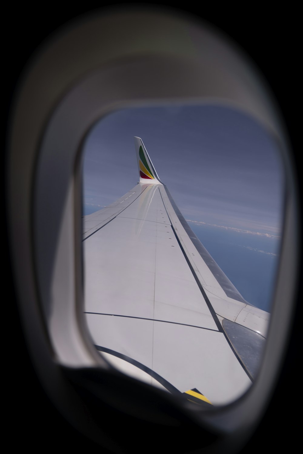 airplane window in close-up photo