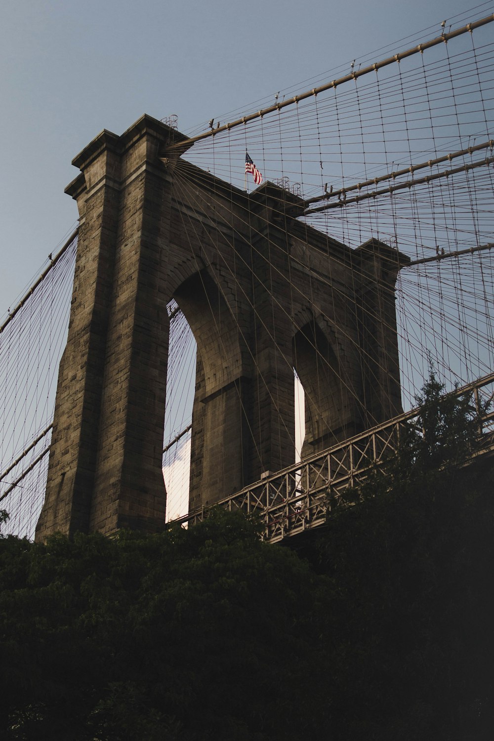 low-angle photography of Manhattan Bridge during daytime