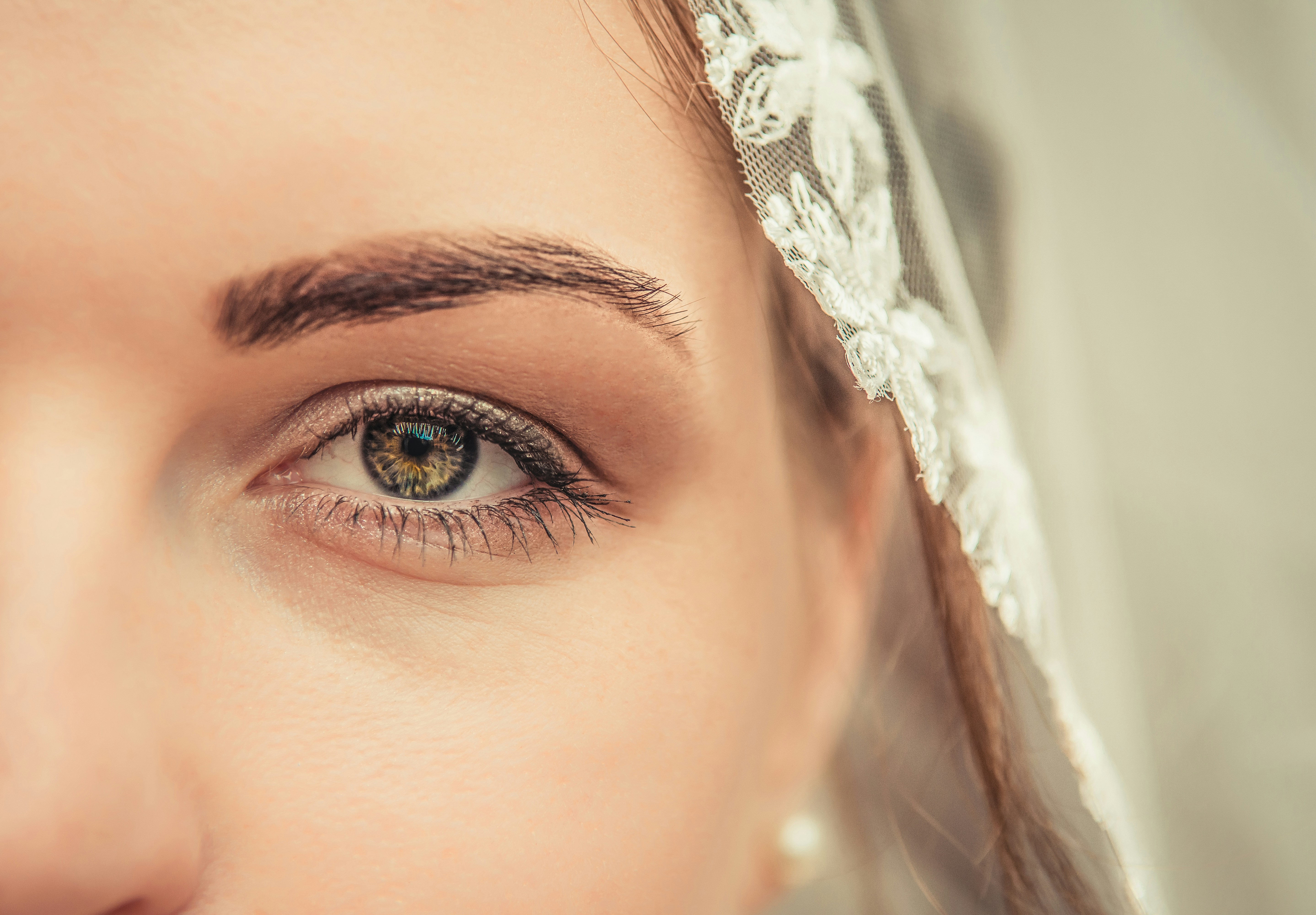 woman's left green eye