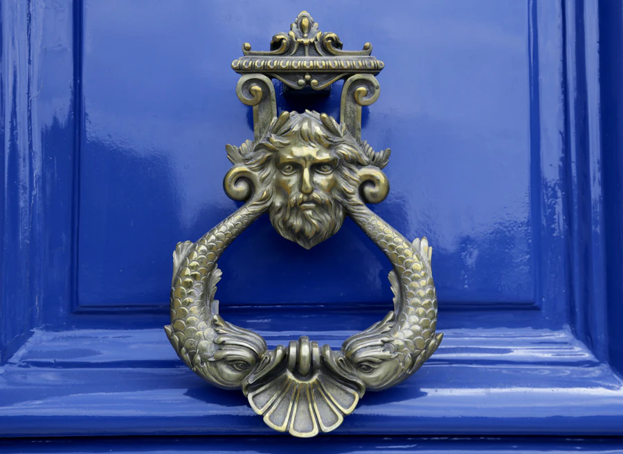 An antique brass door knocker