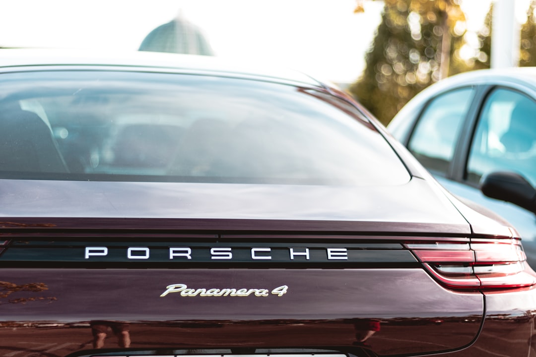 maroon Porsche Panamera 4