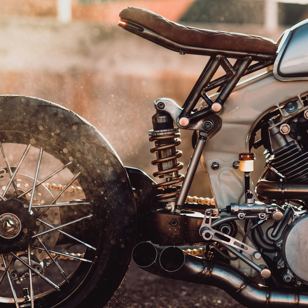 brown and gray motorcycle on brown soil