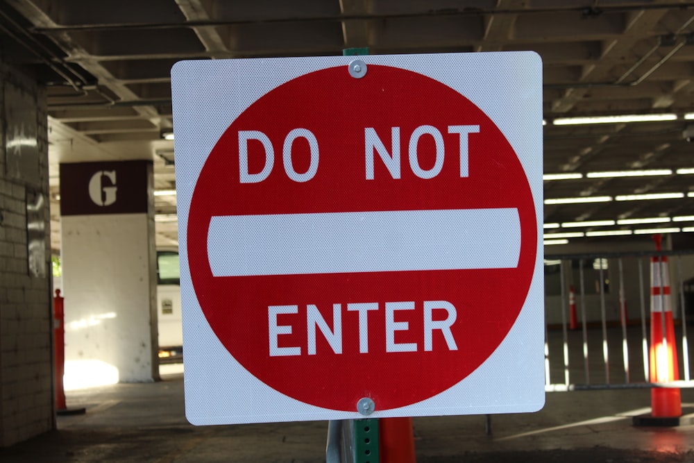 white and red do not enter signboard