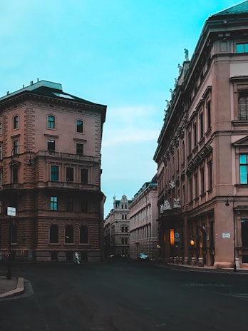 A calm urban scene with soft pastel colors and clean architectural lines.