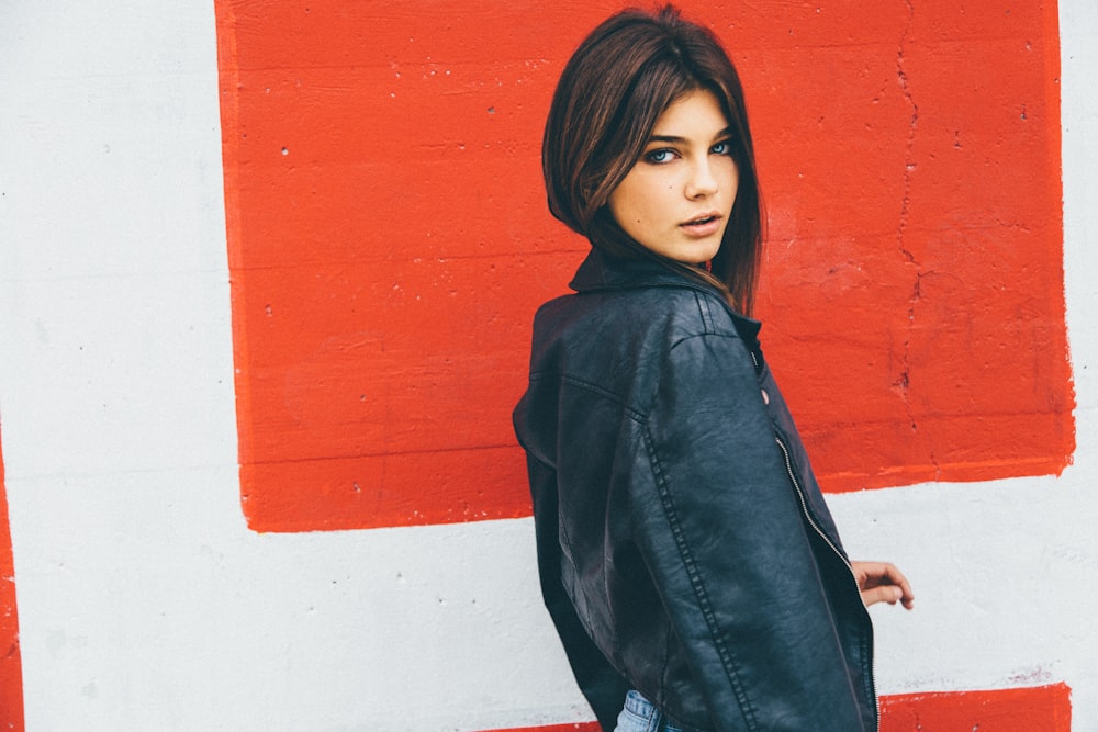 woman wearing black leather jacket