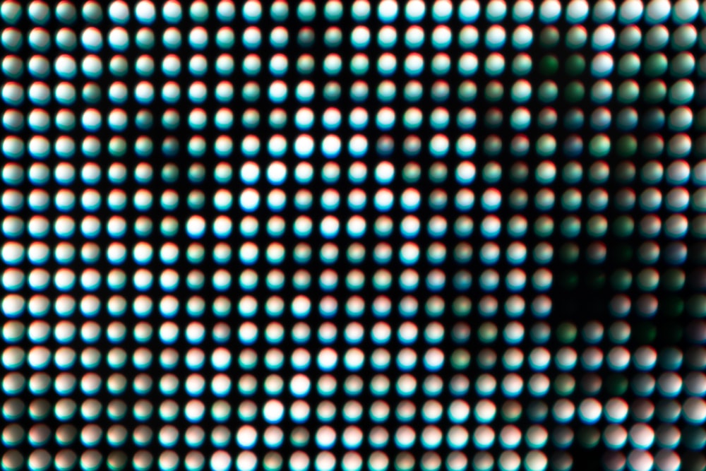 a close up view of a wall with a lot of dots on it