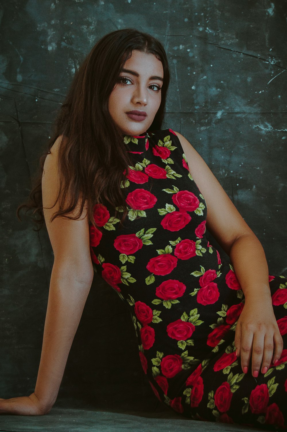 woman wearing black and red floral dress
