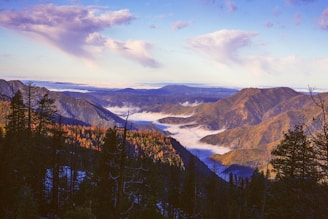 Panoramic view of Bromo landscape with hills and clouds