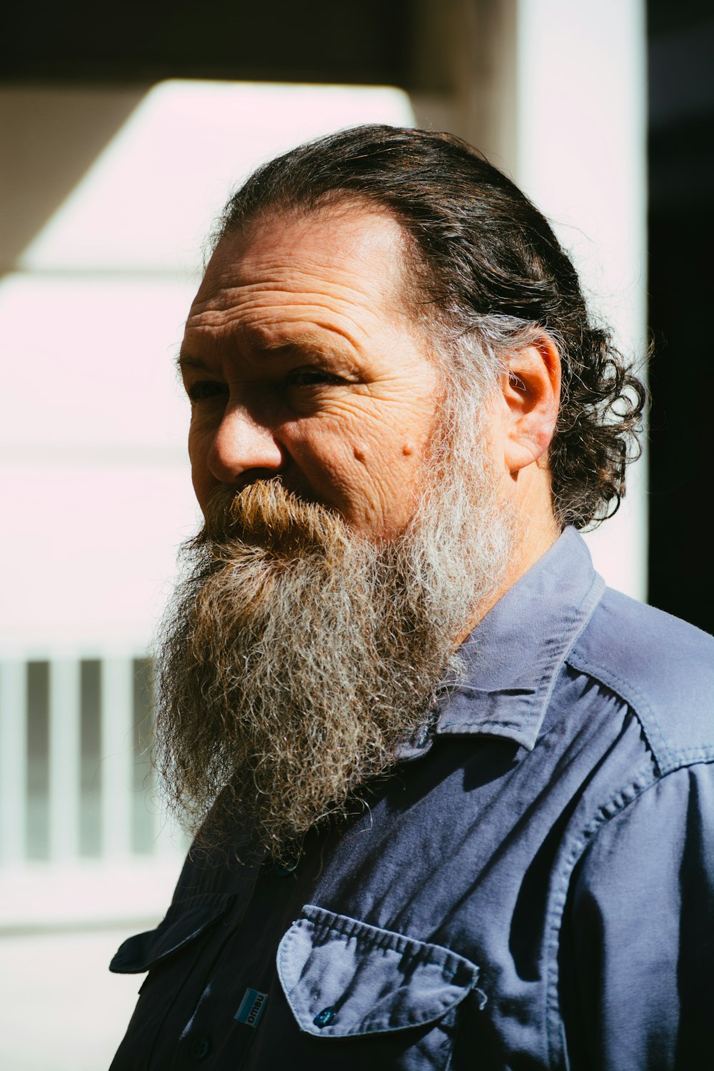 man in blue dress shirt