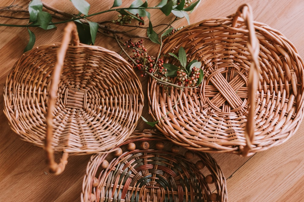 three brown wicker baskets