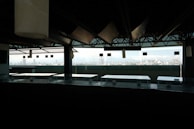 A panoramic view of a commercial space with customized enclosures.