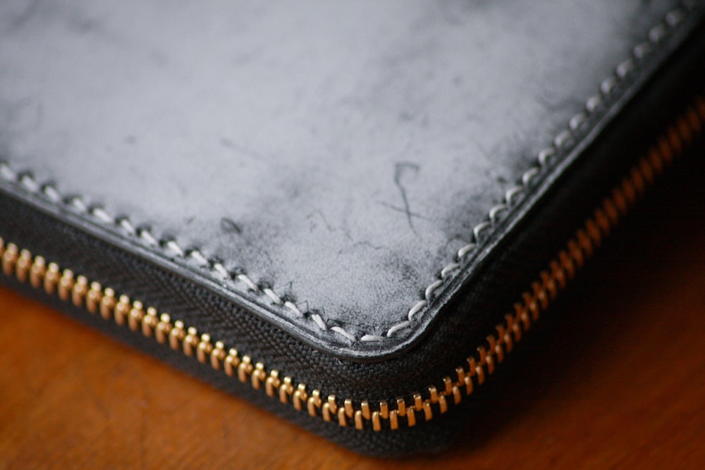 photo of gray leather wallet