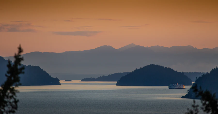 Boat passing islands in Howe Sound