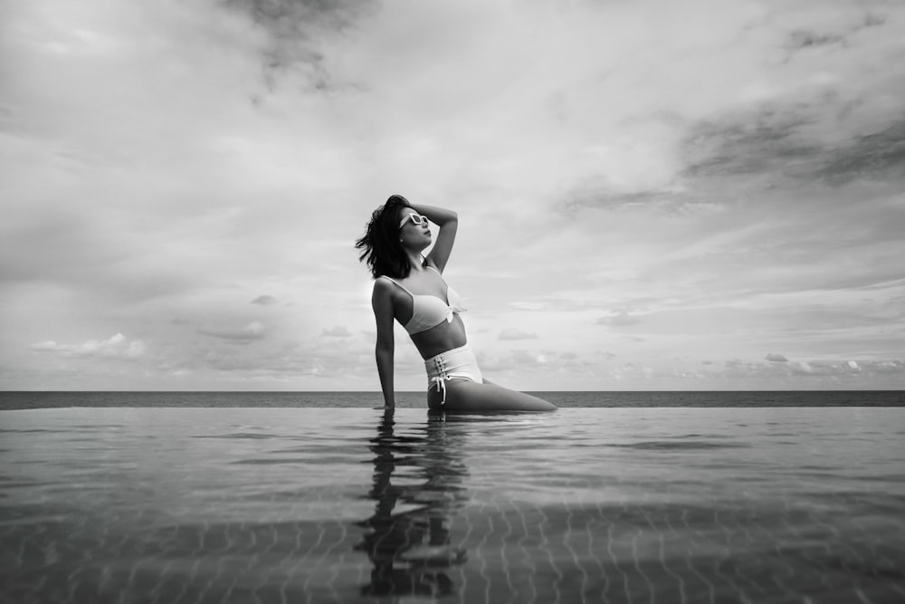 grayscale photo of woman in bikini