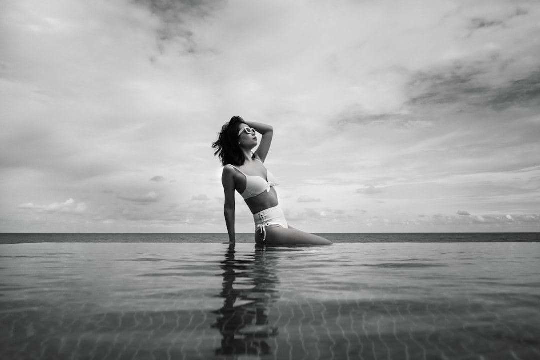 grayscale photo of woman in bikini