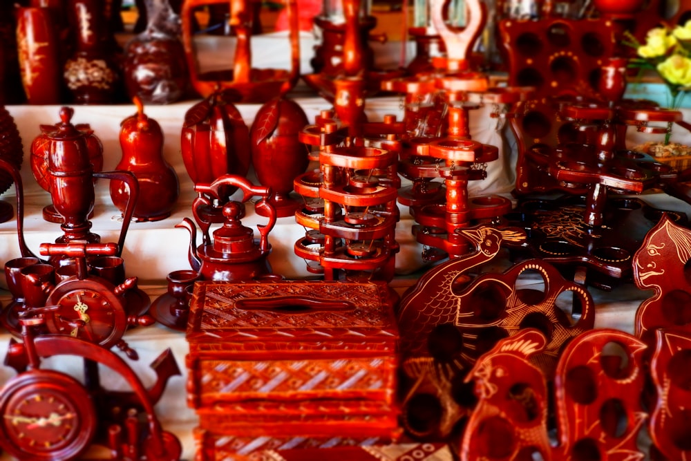 orange and black wood carvings