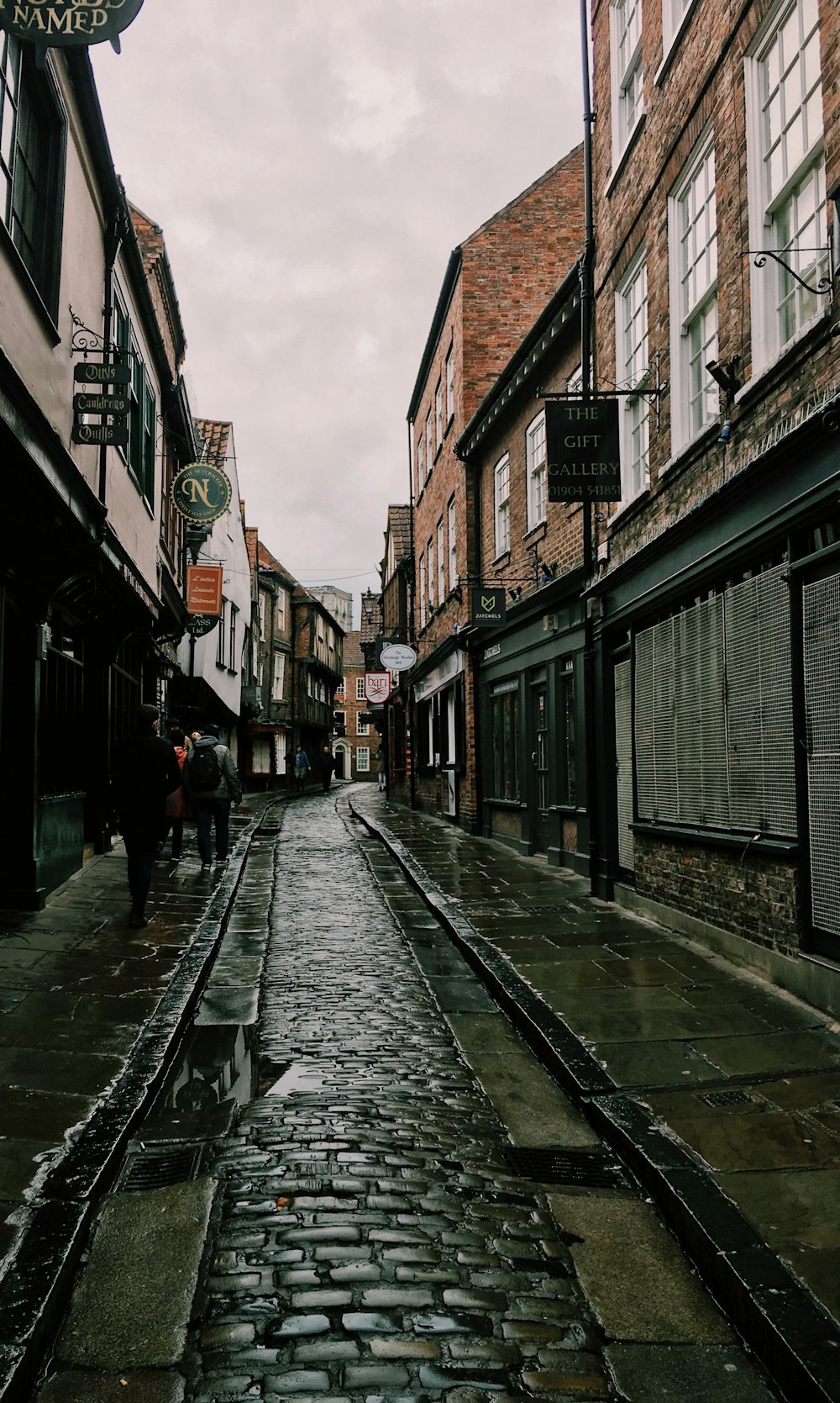 people walking on street during daytime