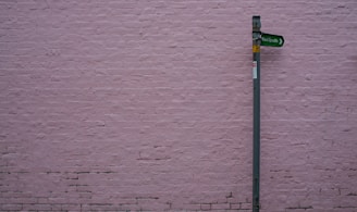 green and grey street sign