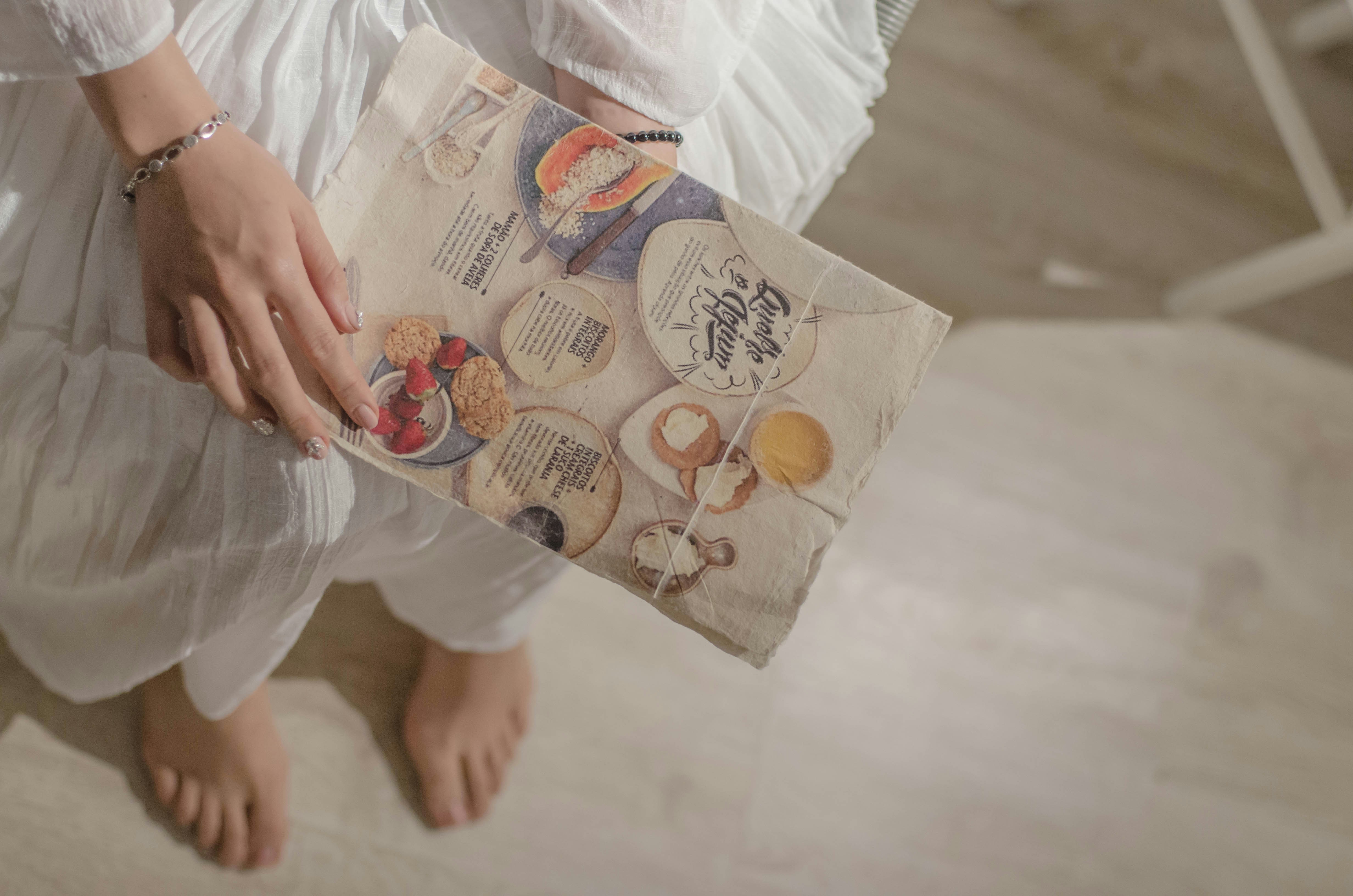 unknown person holding book