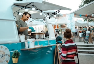 woman wears multicolored striped sweater