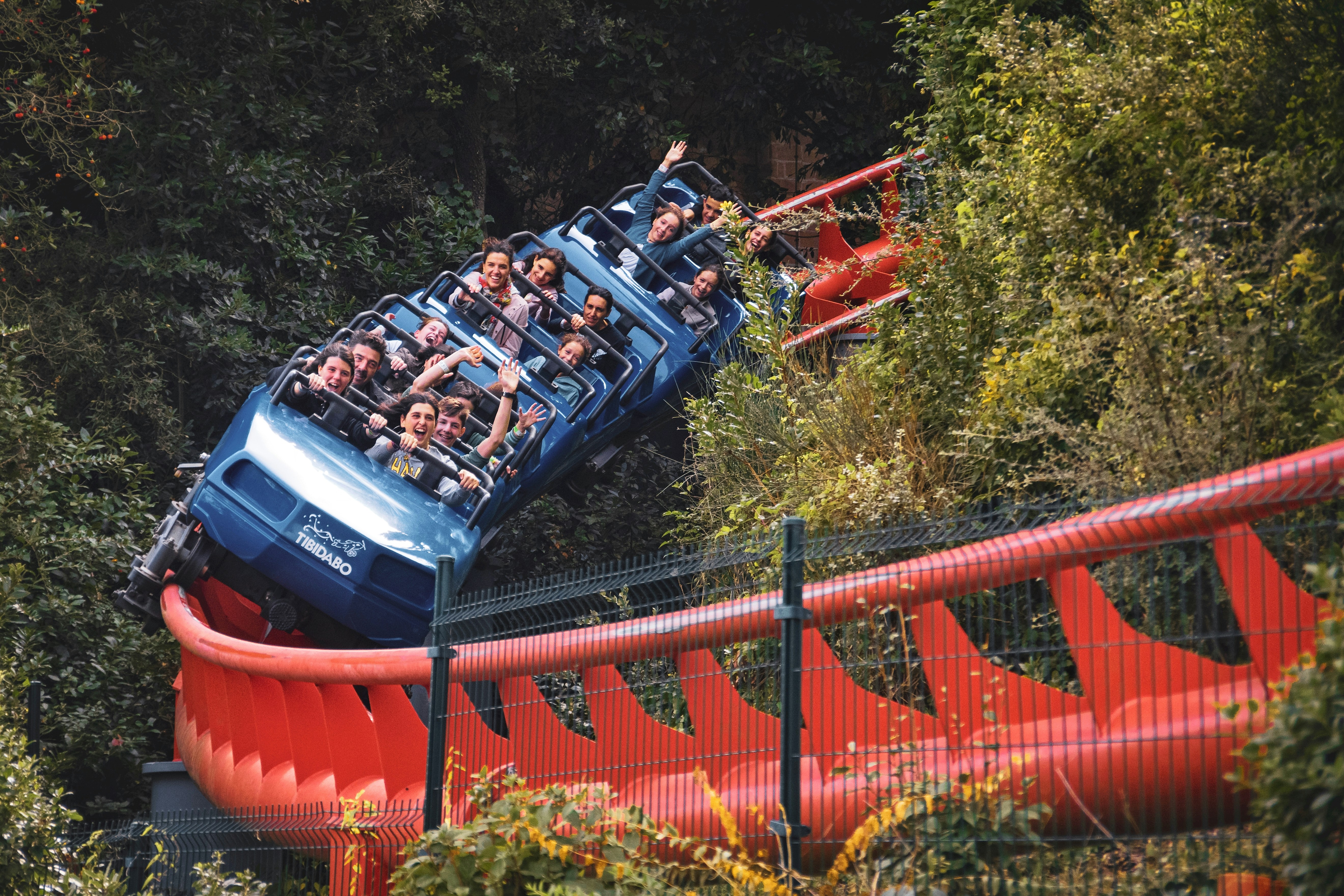 people riding on roller coaster, Roller Coaster of Tibidabo, thematic park in Barcelona