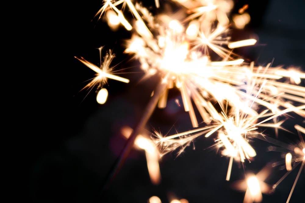 lighted sparkler at night