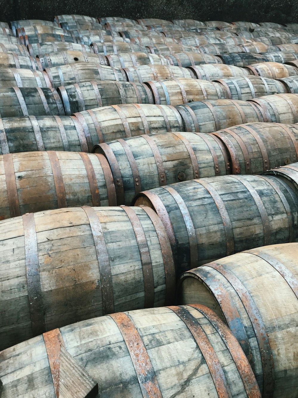 brown wooden barrels
