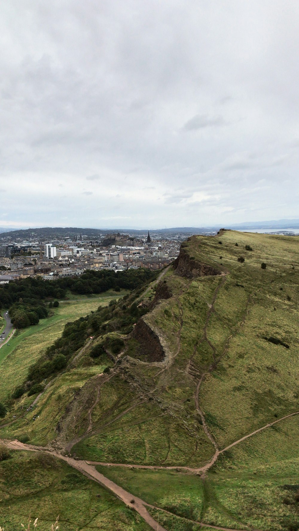 grass mountain during day