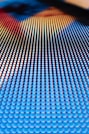 a close up of a blue and yellow background