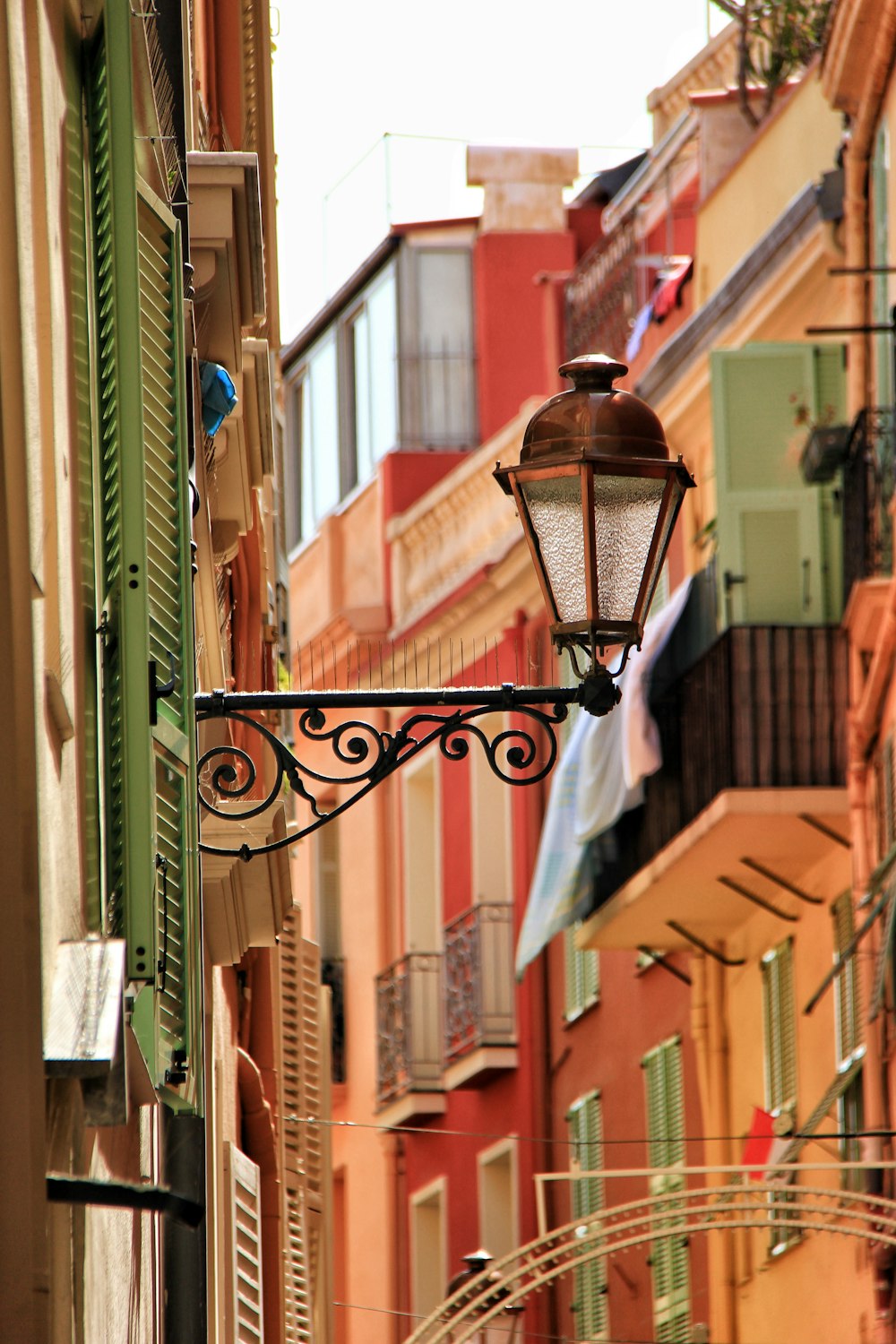 building with outdoor sconce during day