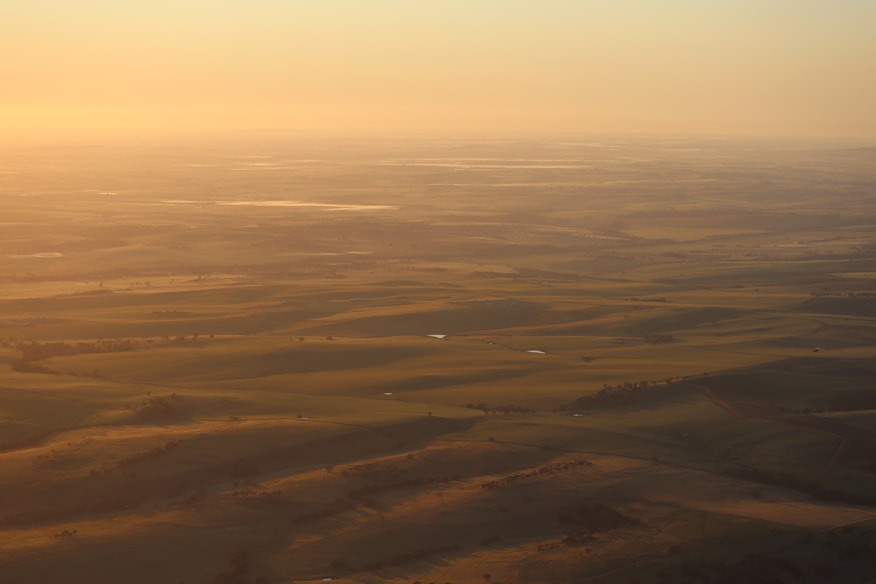 aerial photo of brown field