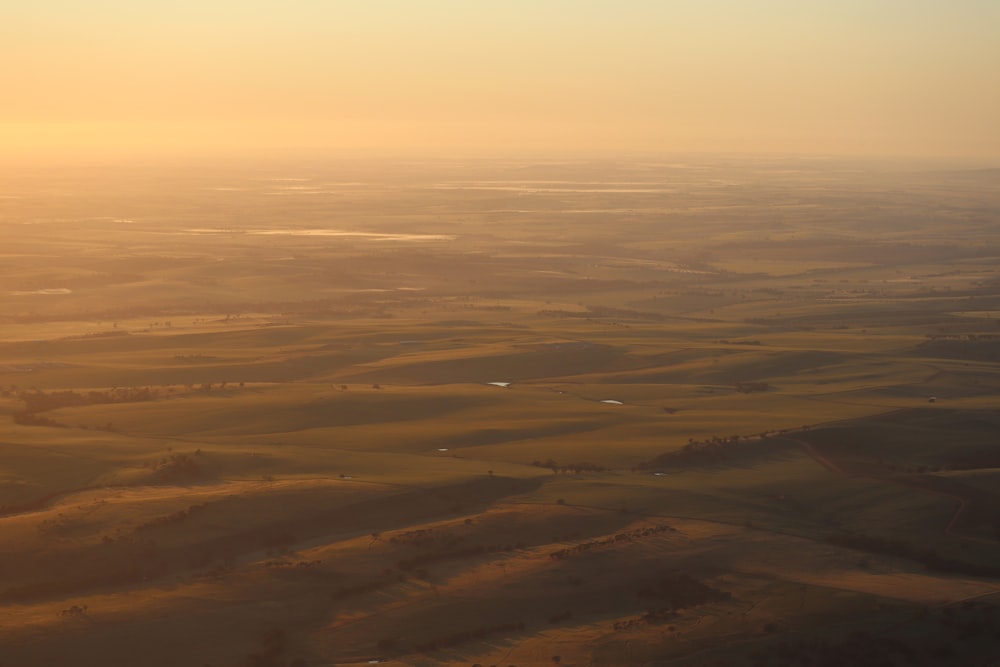 aerial photo of brown field