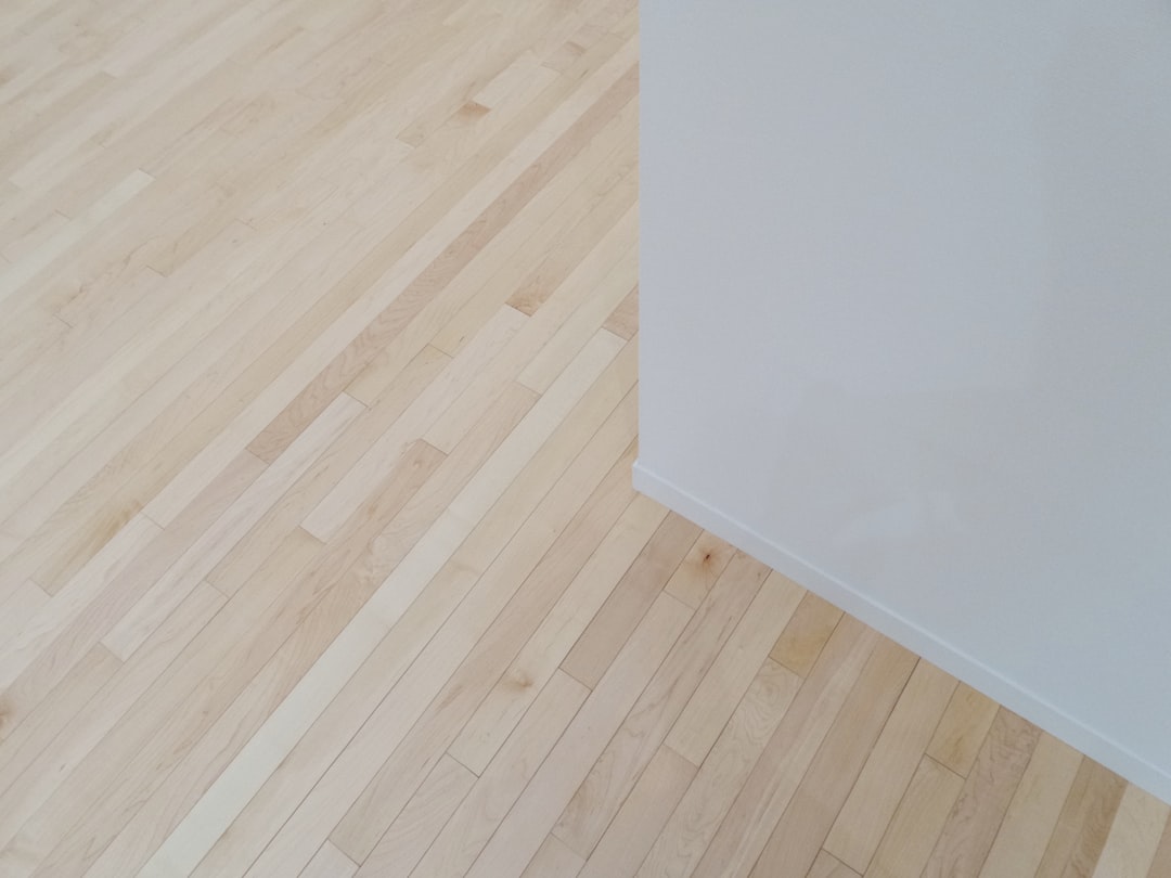 brown parquetry beside wall