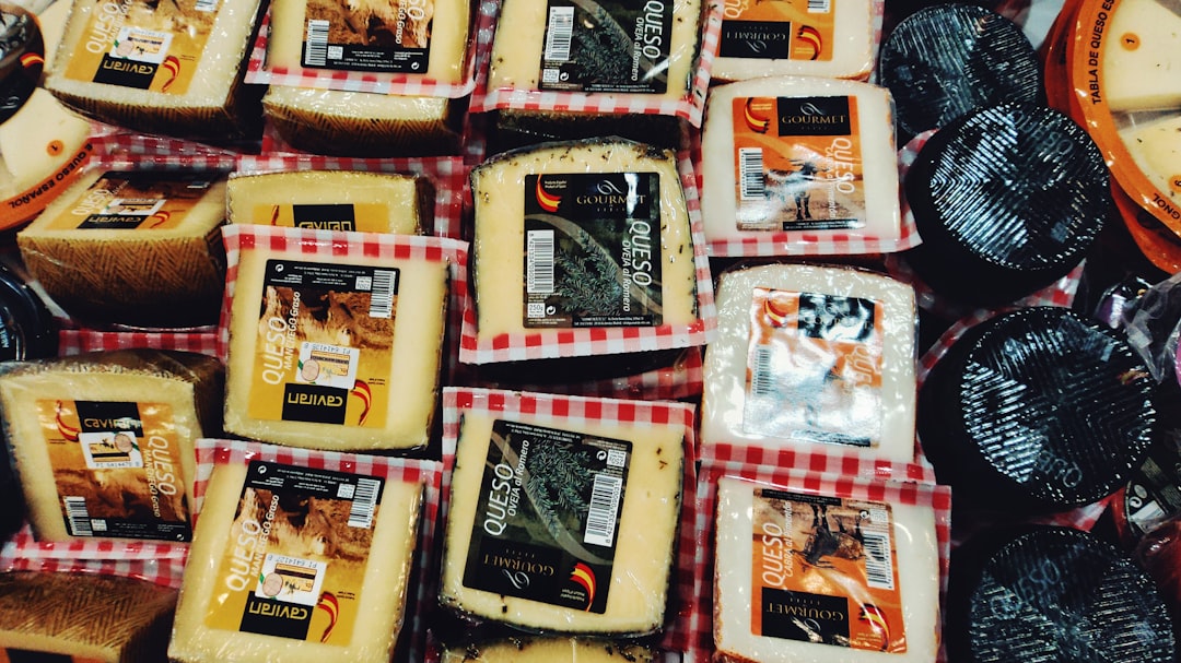 a table topped with lots of different types of cheese, Say Cheese!
