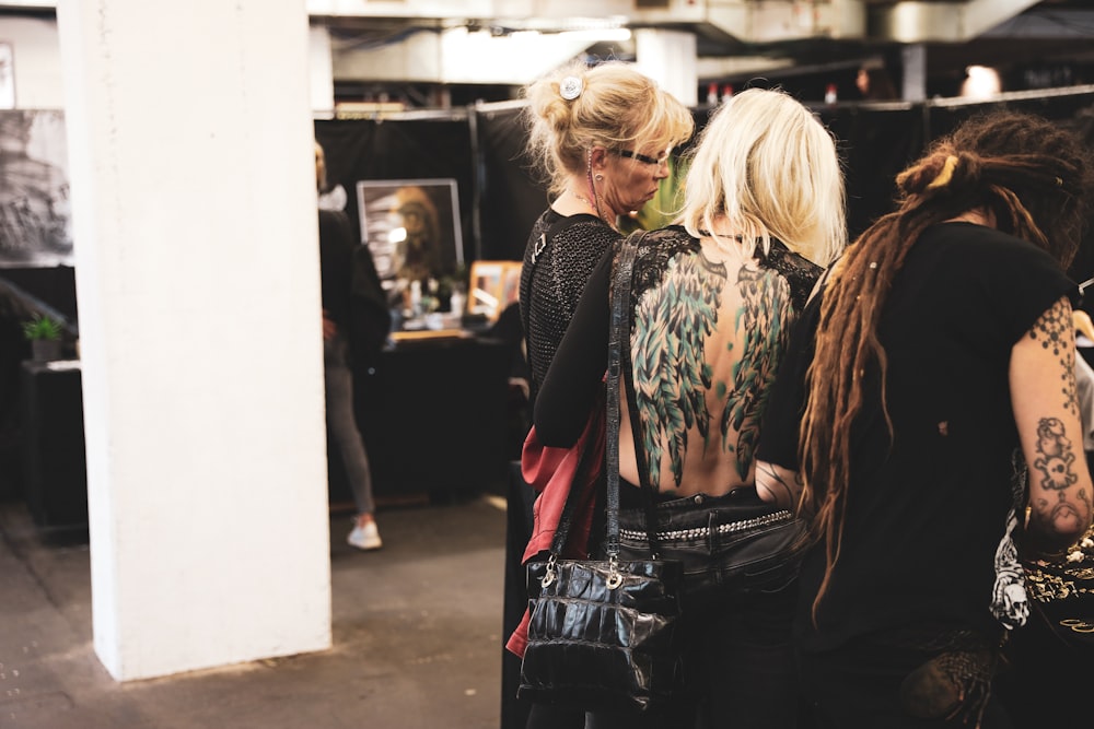 women in black tops