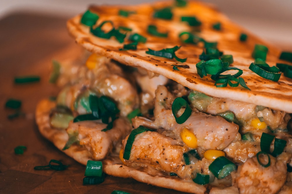 wrapped food on wooden surface