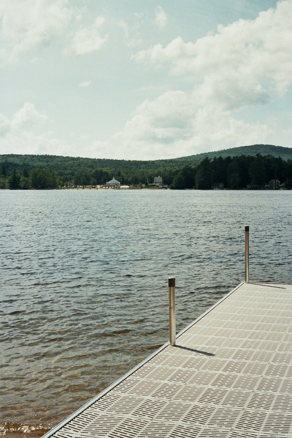 sea near mountain during daytime